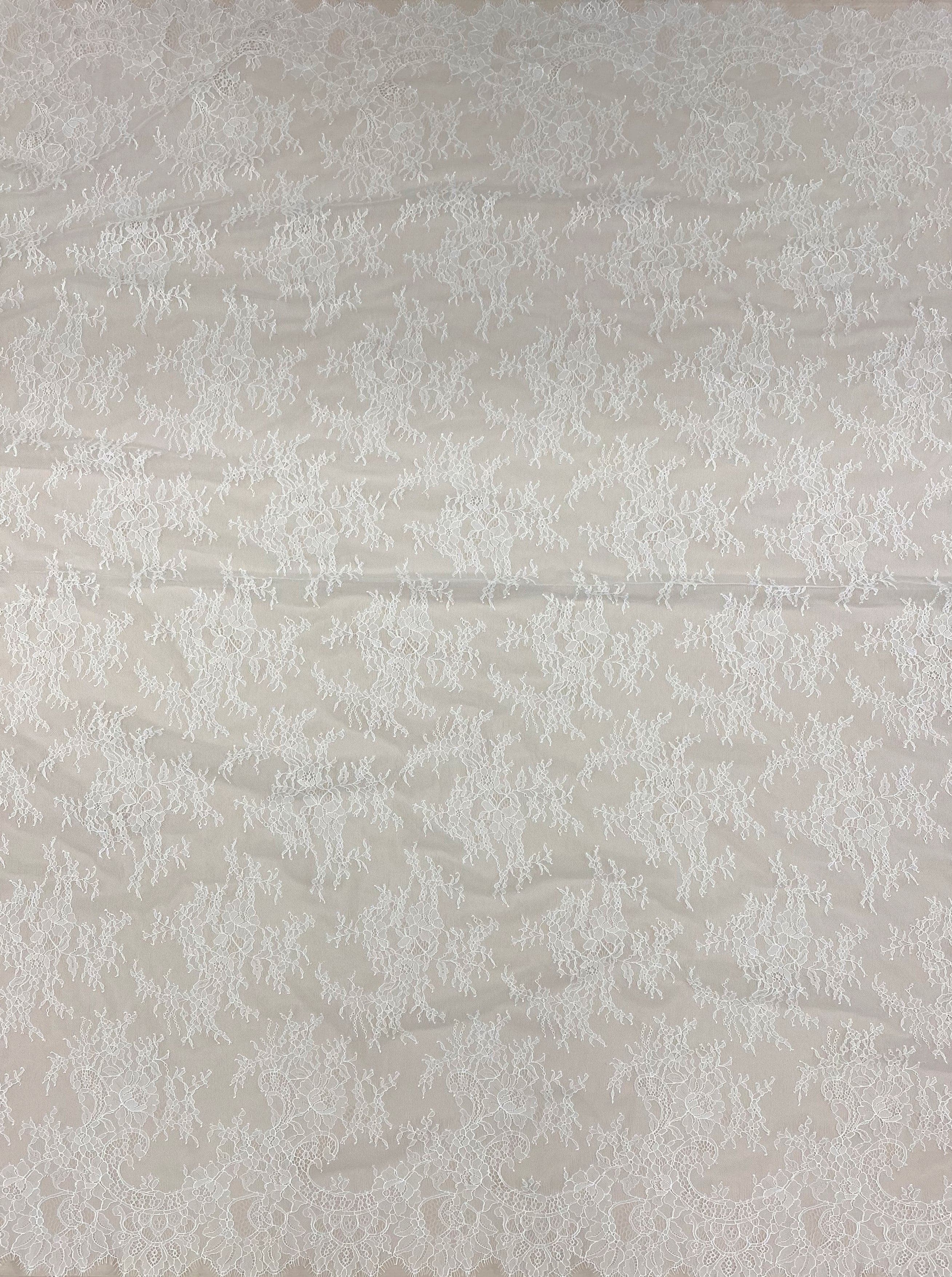 Ivory Fine Floral Lace — featuring scalloped edges, eyelash detail and floral motifs, 130cm wide