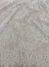 Ivory Fine Floral Lace — featuring scalloped edges, eyelash detail and floral motifs, 130cm wide