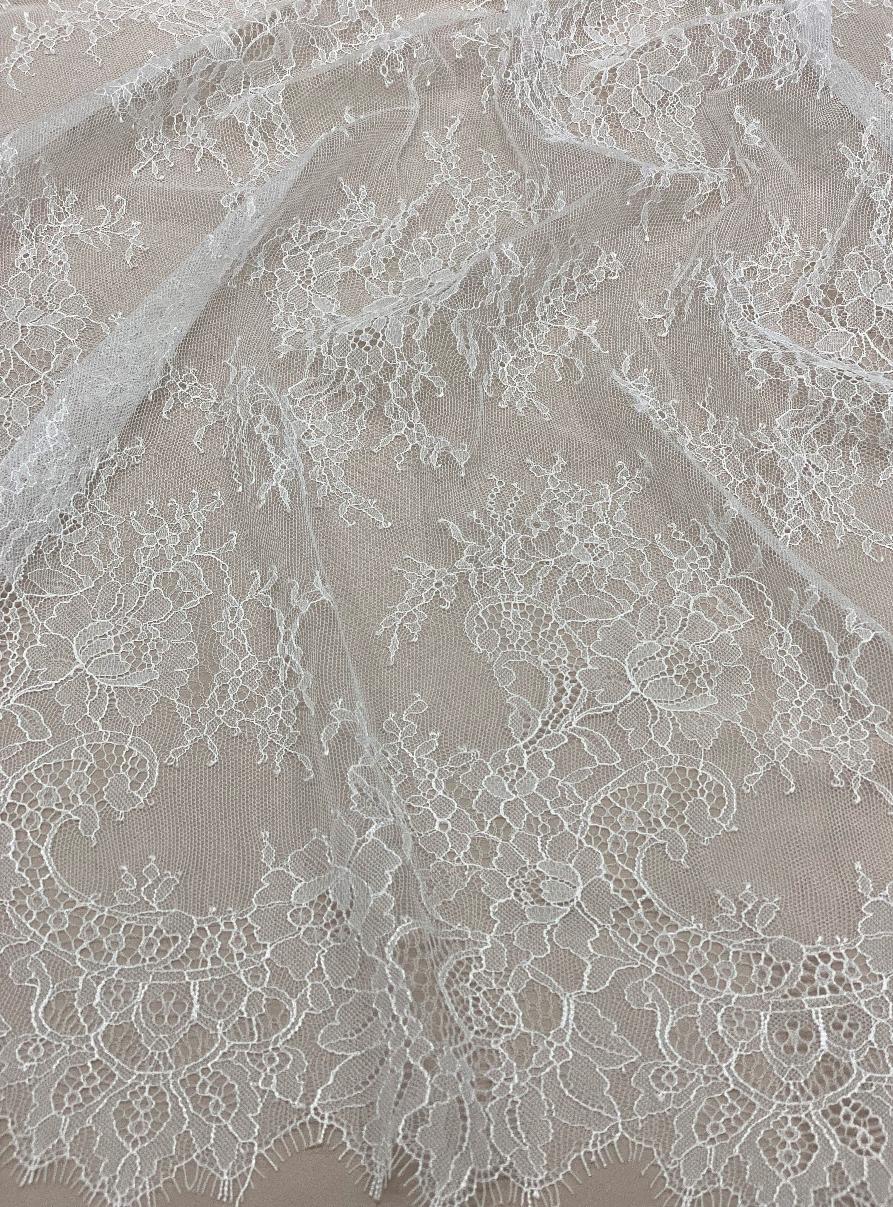 White Fine Floral Lace — featuring scalloped edges, eyelash detail and floral motifs, 130cm wide
