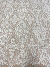 Light Ivory Corded Fine Lace — featuring scalloped edges, eyelash detail, arabesque motifs and a corded texture, 130cm wide