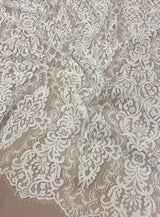 Light Ivory Corded Fine Lace — featuring scalloped edges, eyelash detail, arabesque motifs and a corded texture, 130cm wide