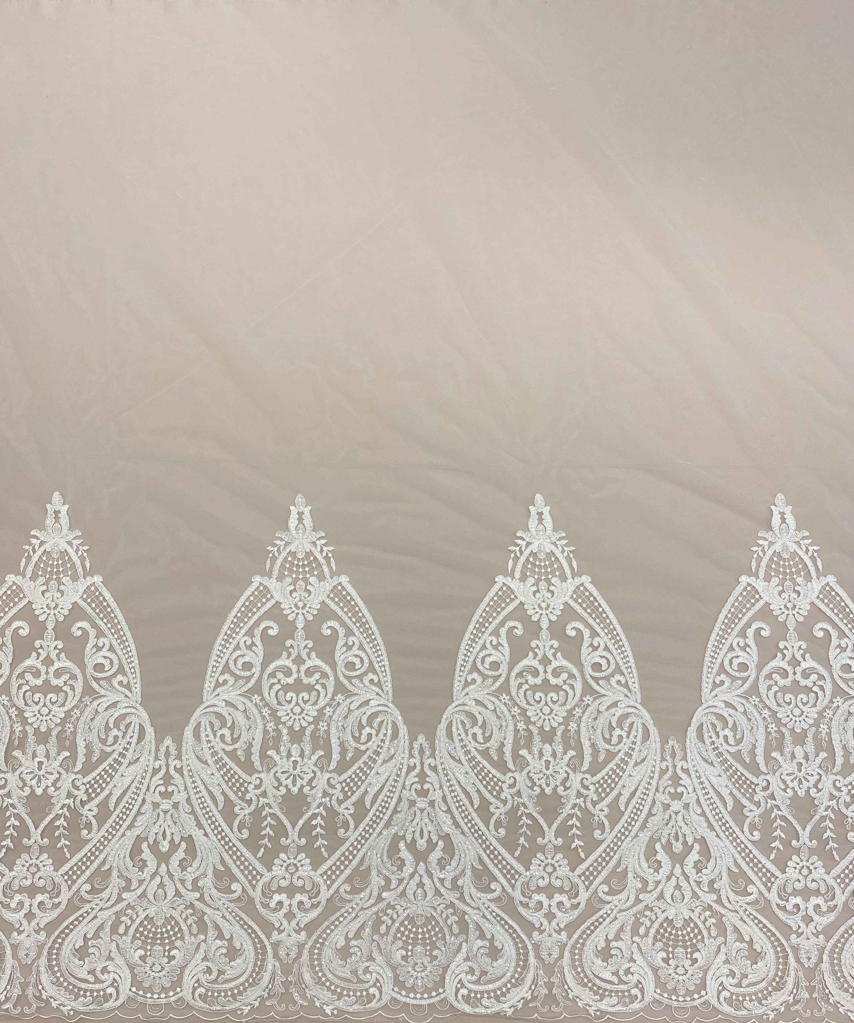 Ivory Embroidered Border Tulle — featuring a border design, 30% nylon 30% rayon 40% polyester, 130cm wide