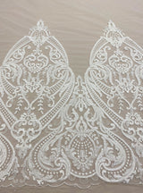 Ivory Embroidered Border Tulle — featuring a border design, 30% nylon 30% rayon 40% polyester, 130cm wide