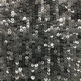 Black Sequined Georgette — a georgette with rows of sequins and a soft drape