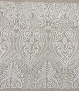 Ivory Embroidered Tulle — featuring scalloped edges and hand-beading, 50% nylon 50% rayon, 135cm wide