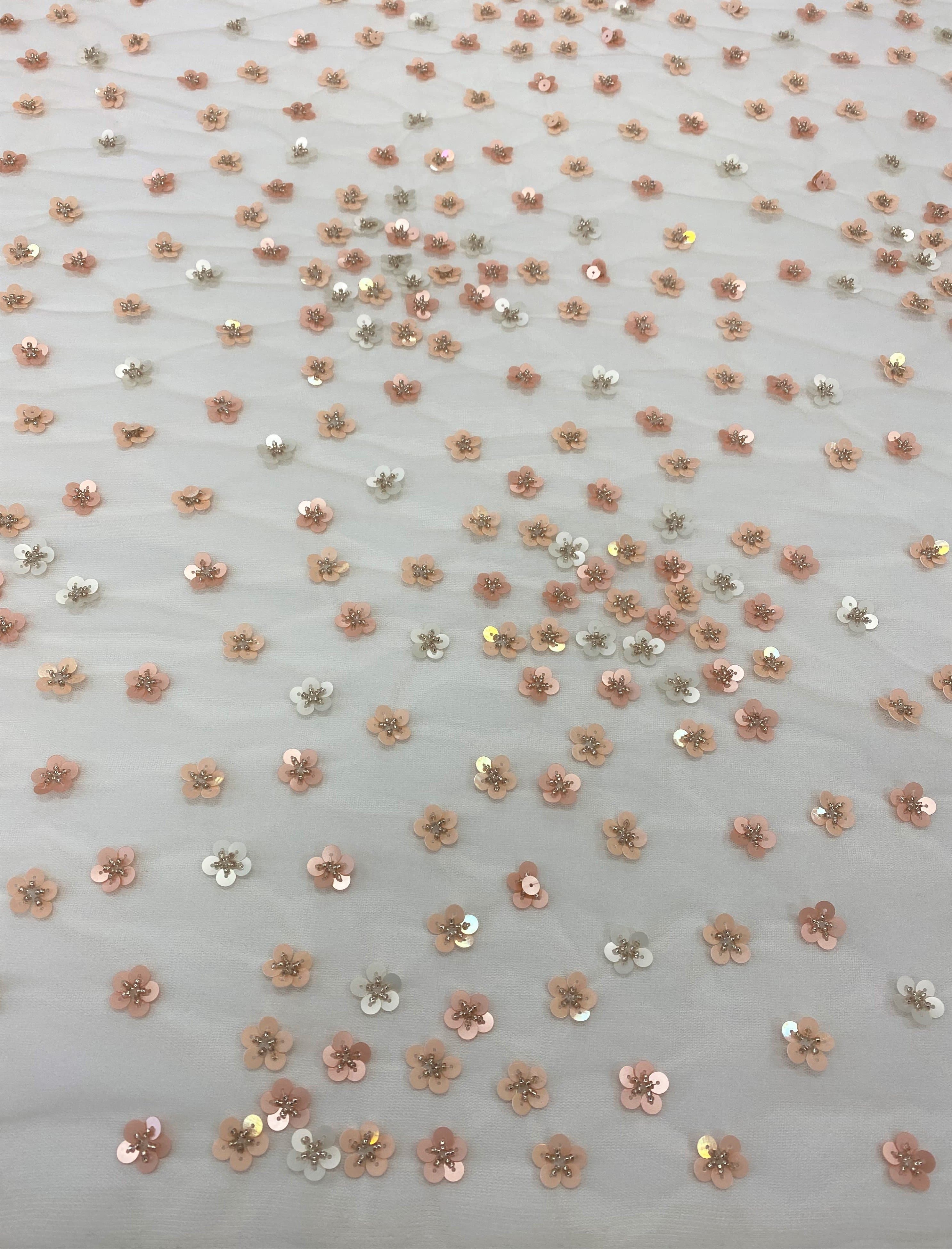 Ivory / Pink Floral Sequin Tulle — featuring hand-beading and sequins, 100% nylon, 110cm wide