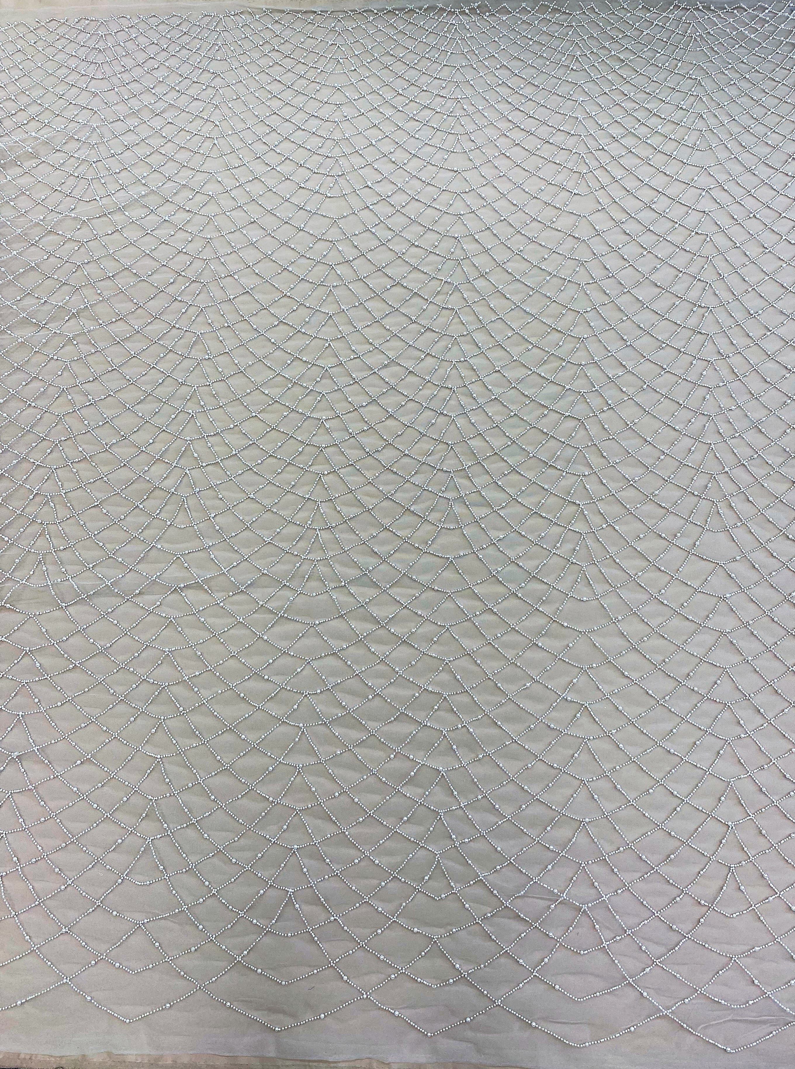 Ivory Embellished Tulle — featuring hand-beading, 100% polyester, 140cm wide