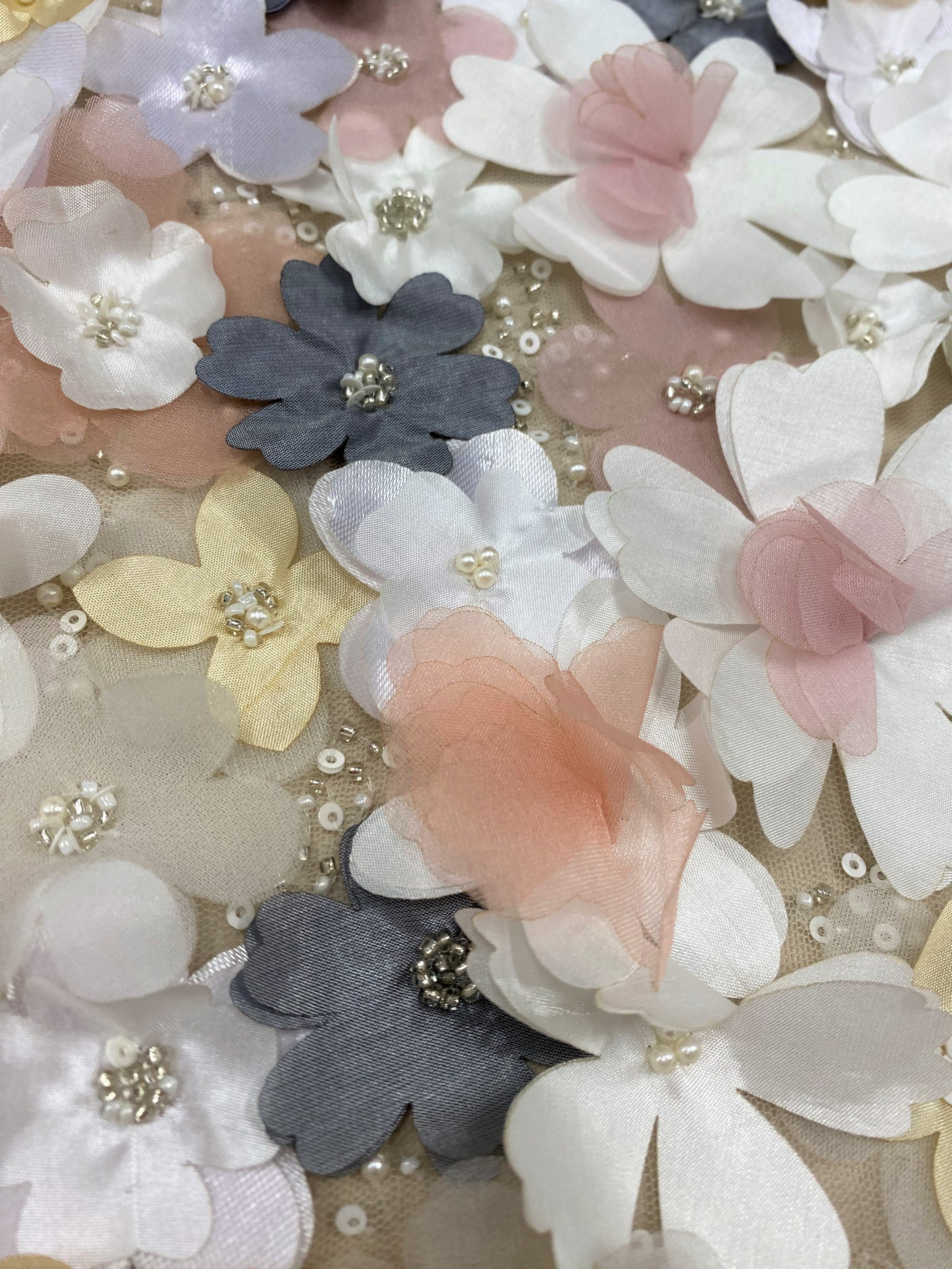 Multi Floral Embellished Tulle — featuring floral motifs, a 3D floral design and hand-beading, 100% polyamide, 105cm wide
