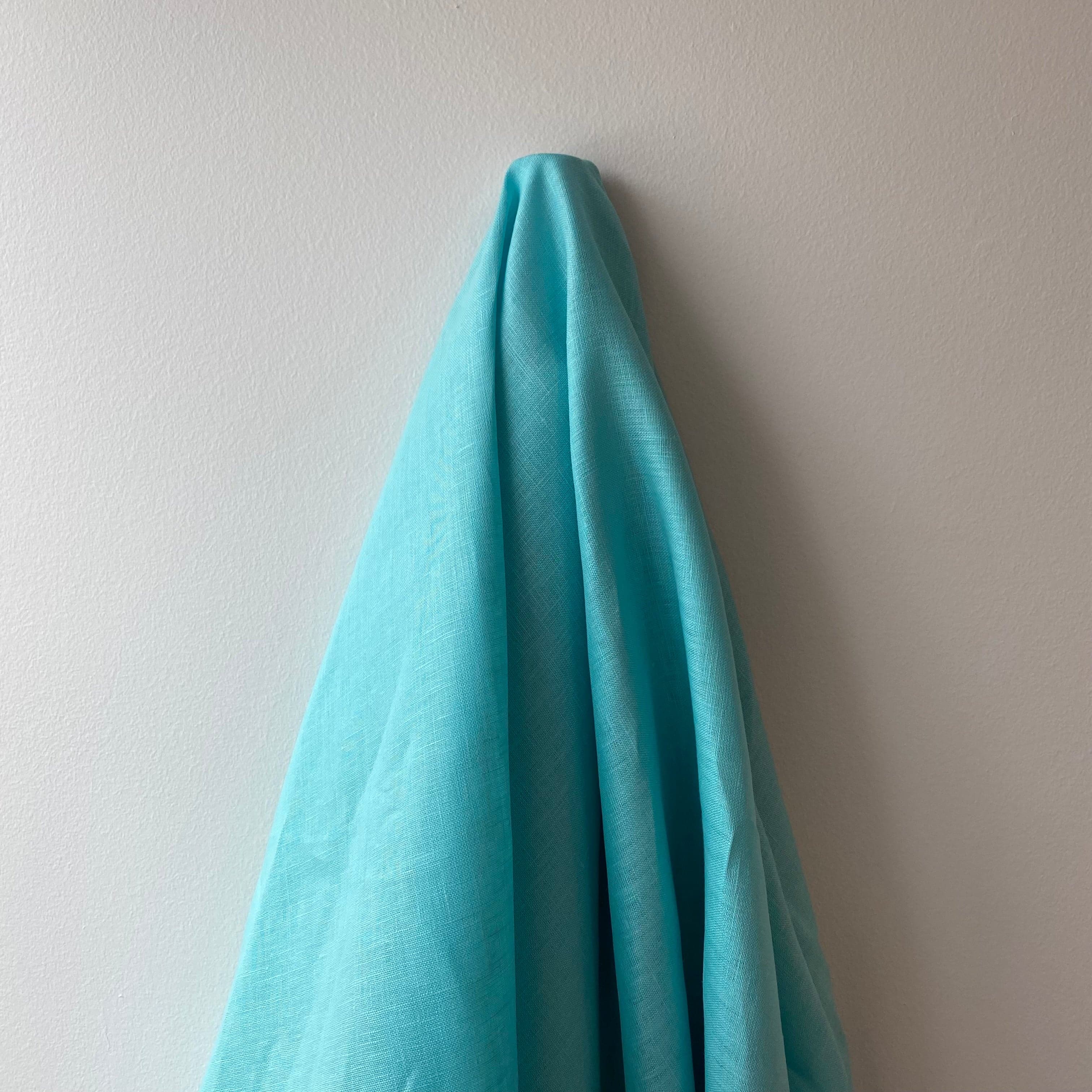 Turquoise Linen — mid-weight plain-weave linen with a slightly crisp handle that softens with wear, 100% linen, 135cm wide
