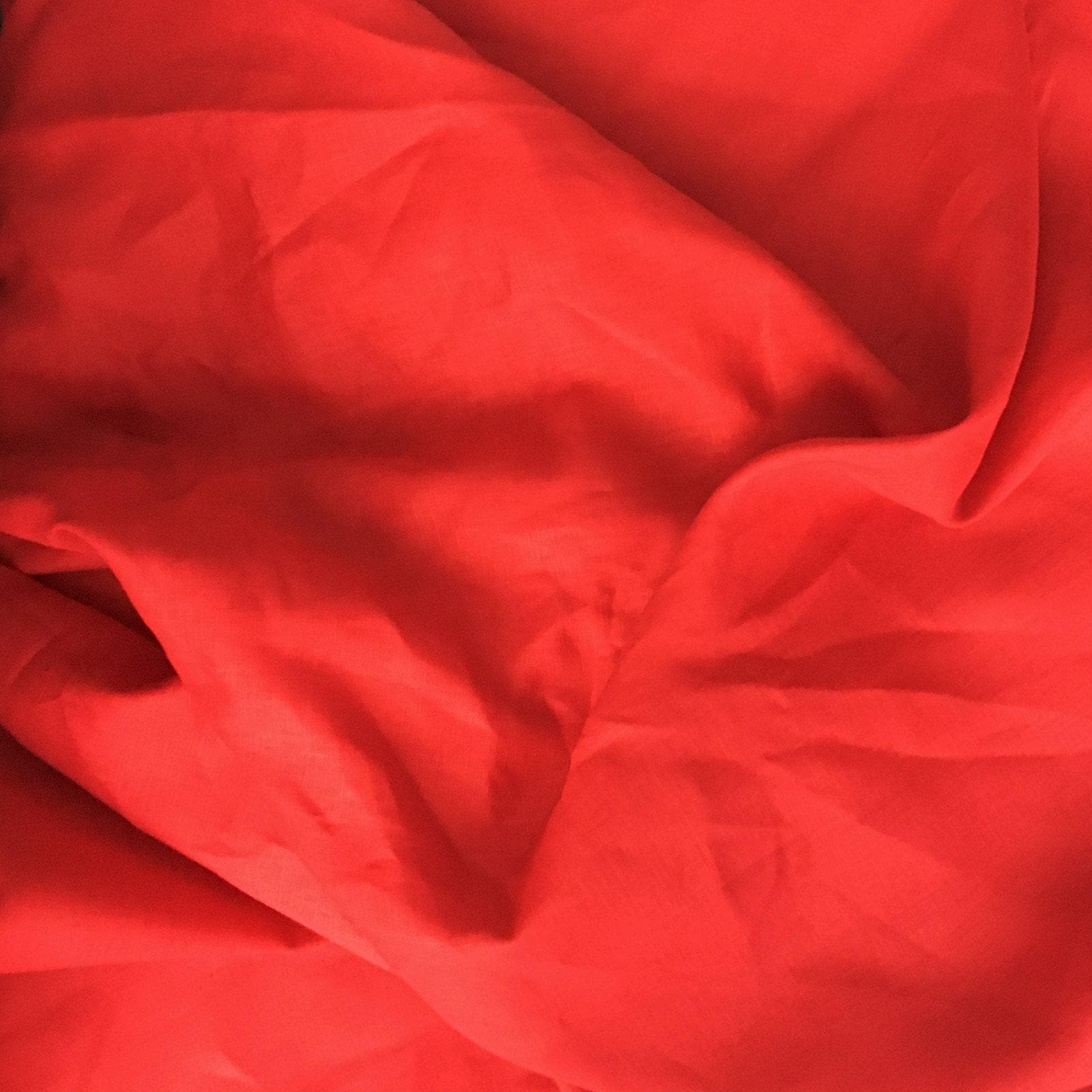 Red Linen — mid-weight plain-weave linen with a slightly crisp handle that softens with wear, 100% linen, 135cm wide