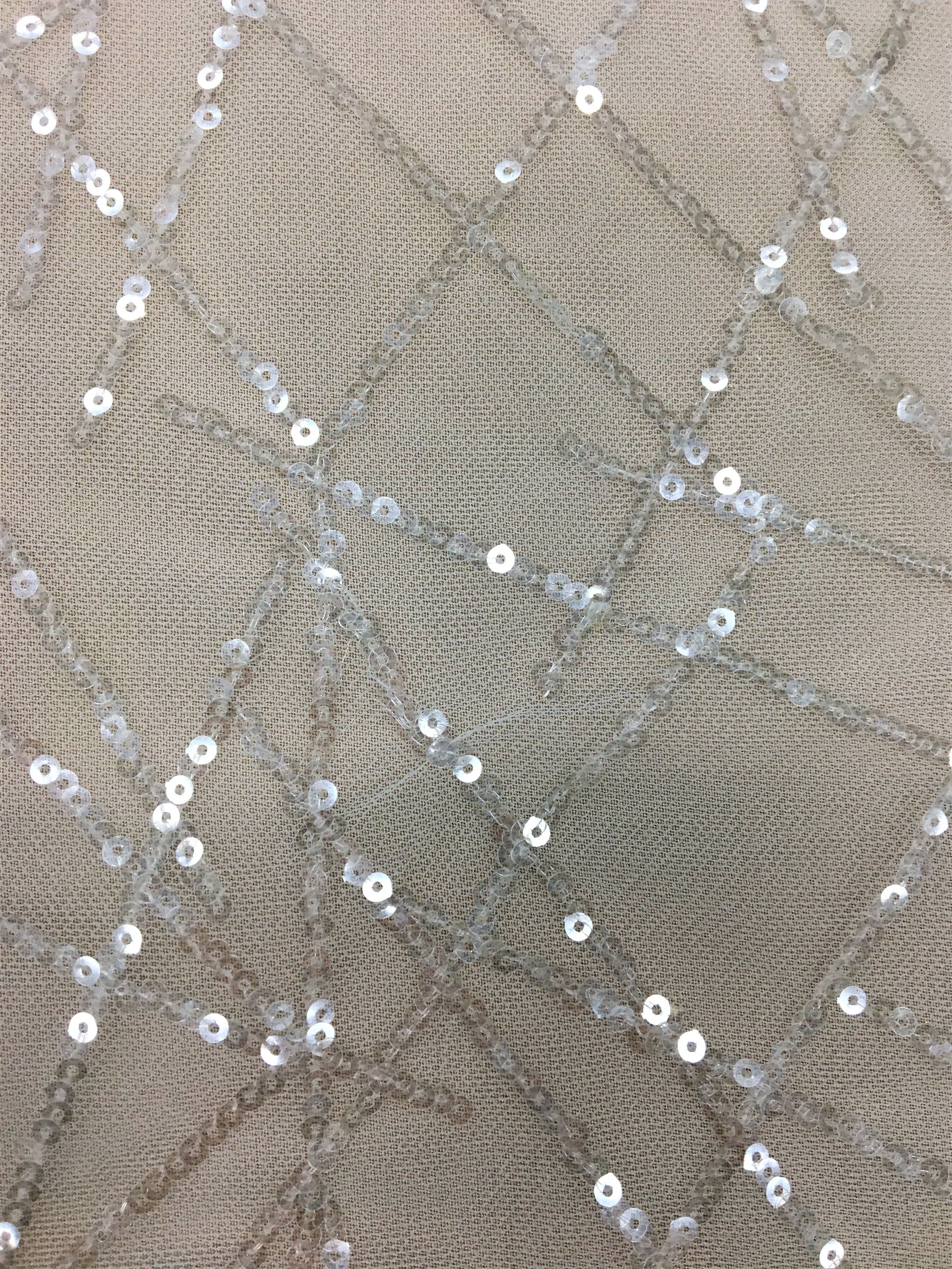 Ivory Sequined Tulle — featuring sequins, 60% rayon 40% nylon, 140cm wide