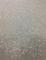 Ivory Sequined Tulle — featuring sequins, 60% rayon 40% nylon, 140cm wide