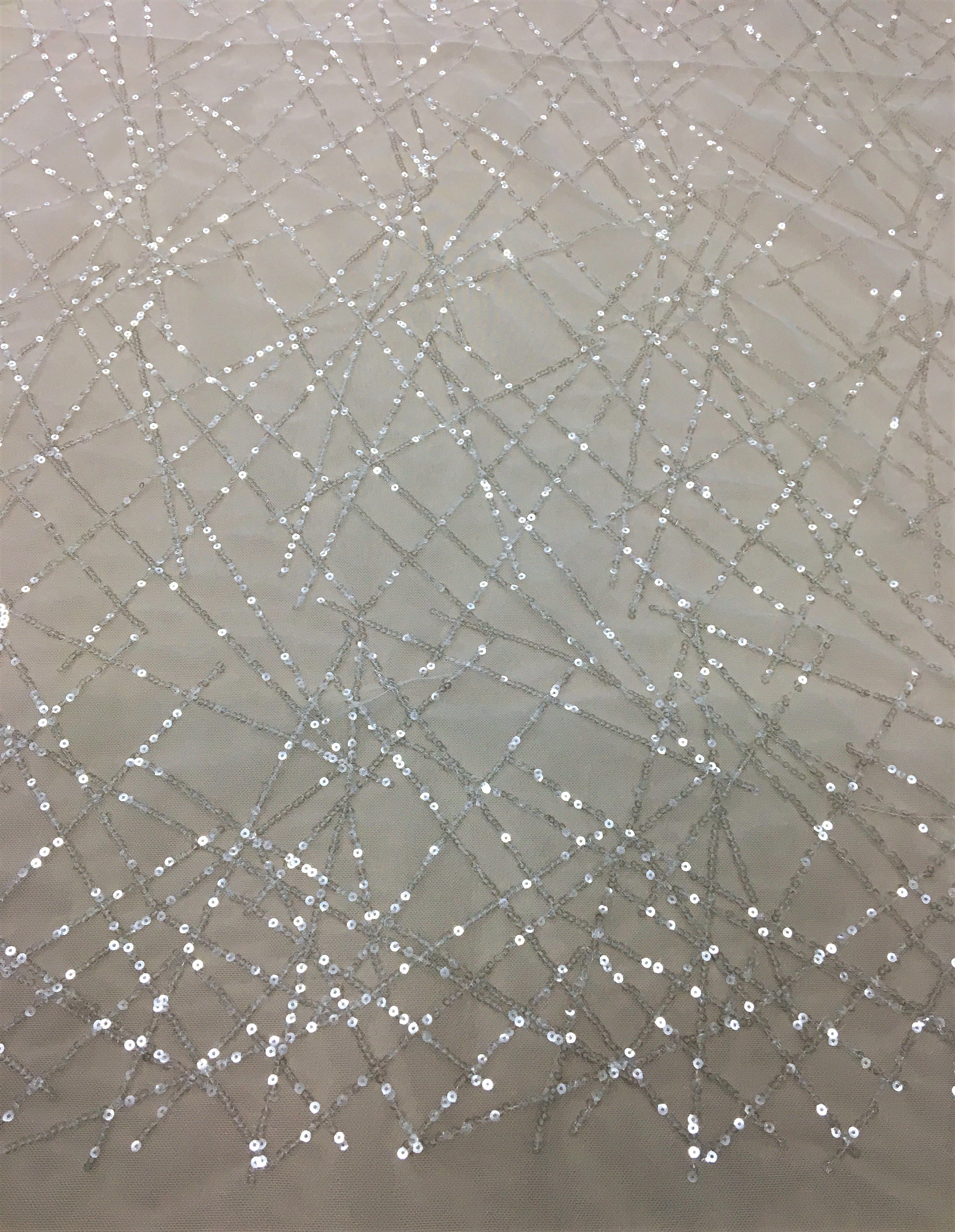 Ivory Sequined Tulle — featuring sequins, 60% rayon 40% nylon, 140cm wide