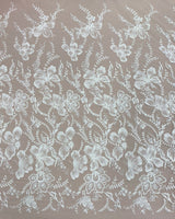 Ivory Embellished Tulle — featuring floral motifs and hand-beading, 60% rayon 40% nylon, 140cm wide