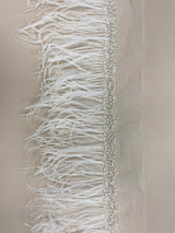 Ostrich feather trim — featuring a soft feather edge with delicate beading, mounted on tulle