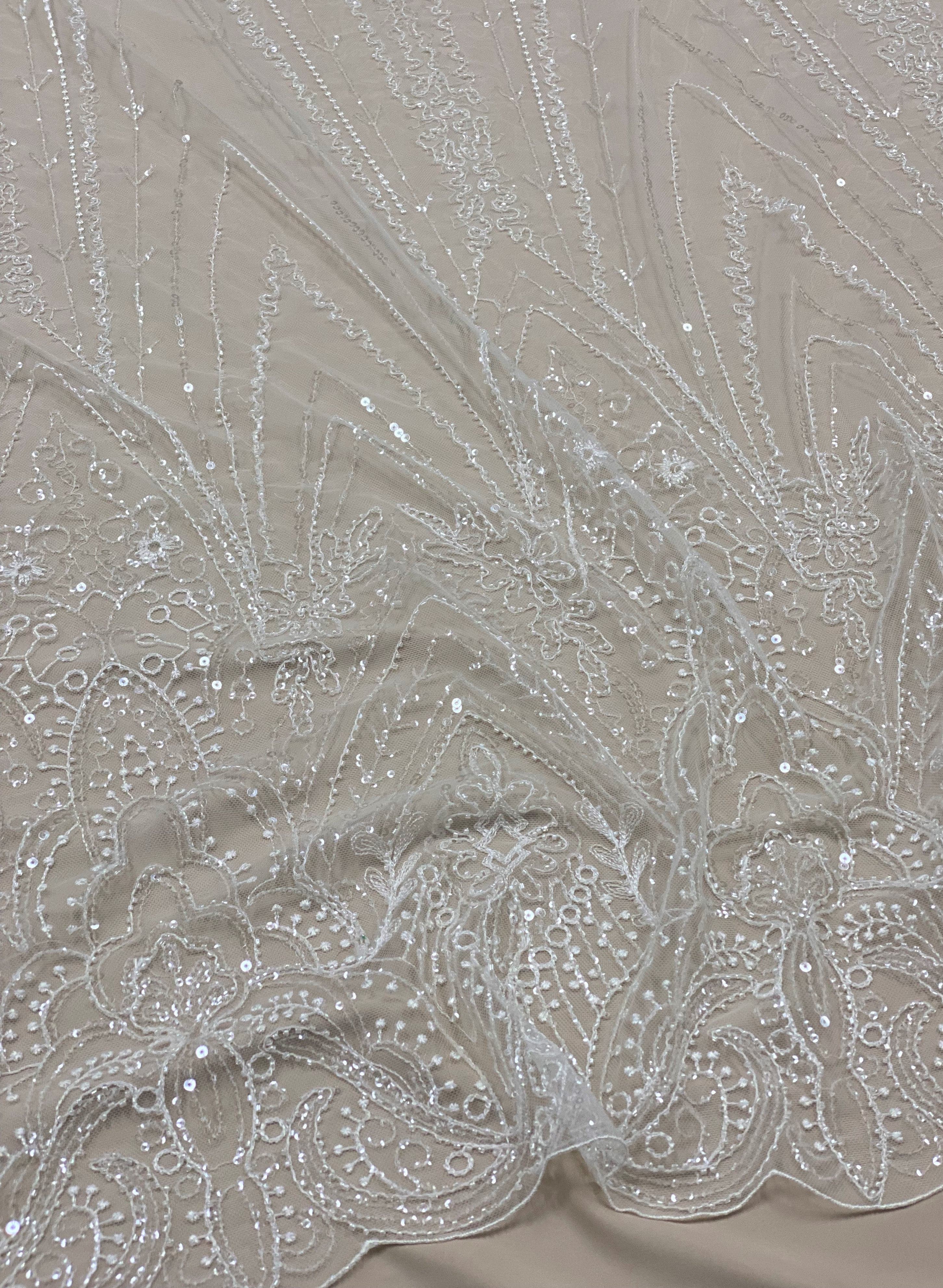 Ivory Embellished Tulle — featuring hand-beading and sequins, 50% nylon 50% rayon, 135cm wide