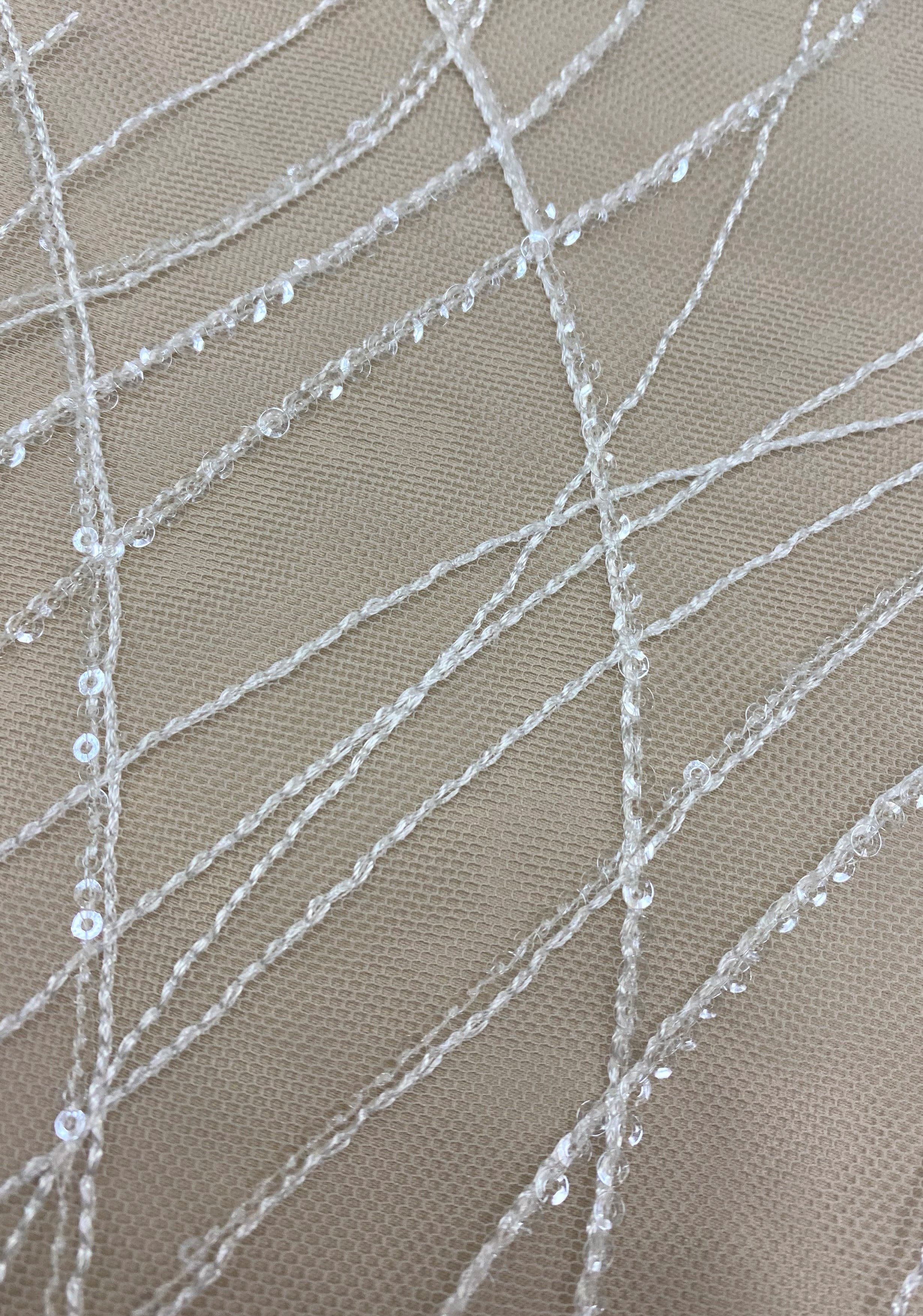 Ivory Embroidered Sequined Tulle — featuring sequins, 50% rayon 50% nylon, 130cm wide