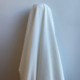 Ivory Recycled Waffle Knit — a soft waffle-textured knit in recycled polyester