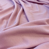 Tea Rose Recycled Waffle Knit — a soft waffle-textured knit in recycled polyester