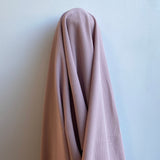 Tea Rose Recycled Waffle Knit — a soft waffle-textured knit in recycled polyester