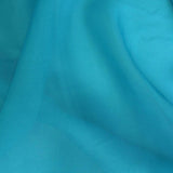 Aquamarine Satin Chiffon — lightweight and sheer with a fluid, airy drape and a smooth satin luster finish, 100% mulberry silk, 140cm wide