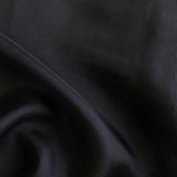 Black Satin Chiffon — lightweight and sheer with a fluid, airy drape and a smooth satin luster finish, 100% mulberry silk, 140cm wide