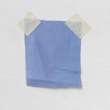 Cornflower Linen — mid-weight plain-weave linen with a slightly crisp handle that softens with wear, 100% linen, 135cm wide