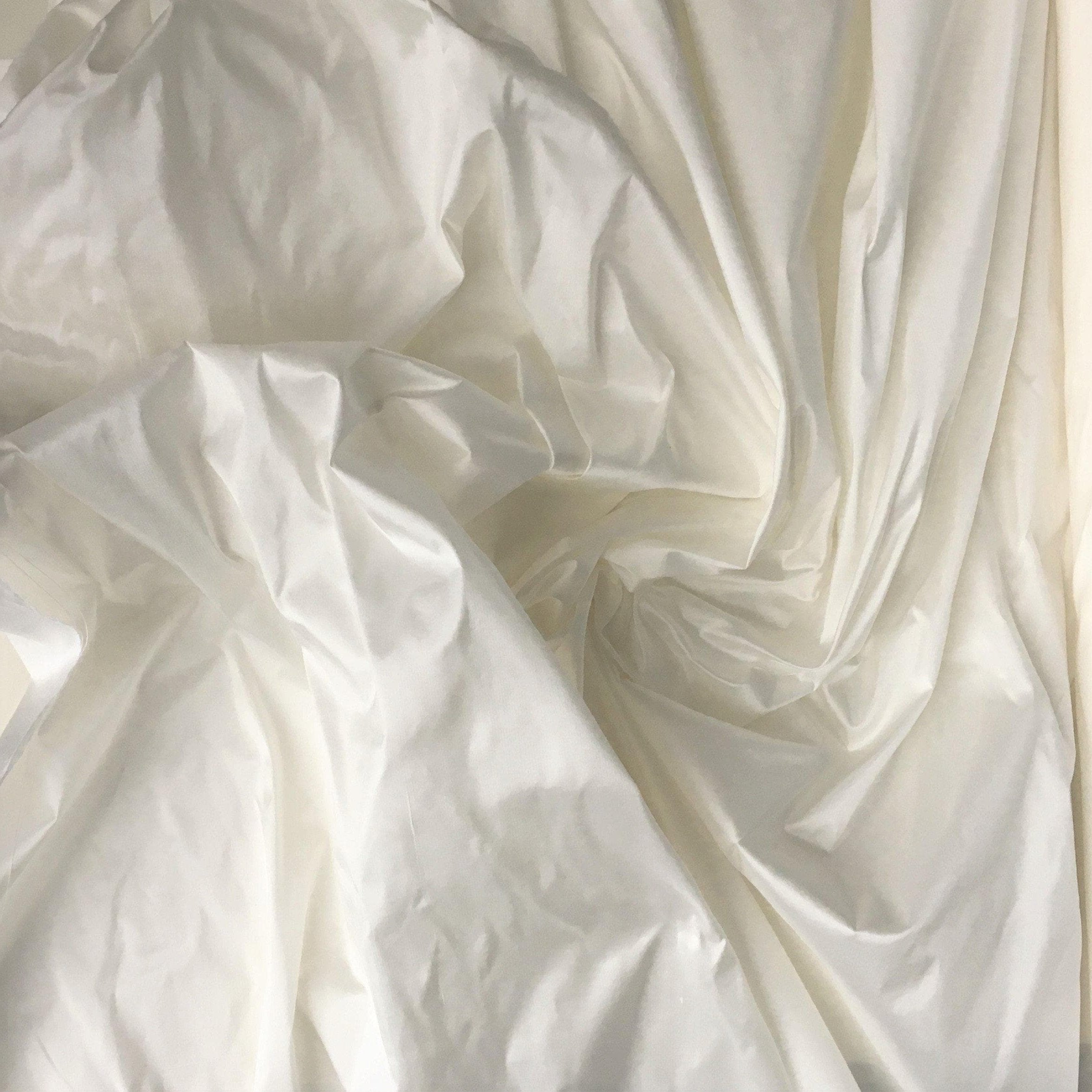 Ivory Silk Dupion — mid-weight and crisp with a lightly slubbed texture, 100% silk, 140cm wide