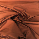Terracotta Silk Dupion — mid-weight and crisp with a lightly slubbed texture, 100% silk, 137cm wide