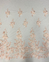 Blush 3D Floral Tulle — featuring floral motifs, a 3D floral design and a border design, 40% polyester 30% nylon 30% rayon, 130cm wide
