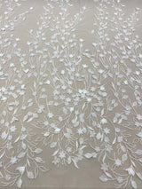 Ivory Embellished Tulle — featuring floral motifs and a botanical design, 30% nylon 40% polyester 30% rayon, 130cm wide