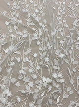 Ivory Embellished Tulle — featuring floral motifs and a botanical design, 30% nylon 40% polyester 30% rayon, 130cm wide