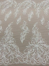 Ivory Embroidered Tulle — featuring a leaf design and hand-beading, 30% nylon 30% rayon 40% polyester, 130cm wide