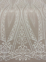 Ivory Embroidered Tulle — featuring scalloped edges and sequins, 30% nylon 30% rayon 40% polyester, 130cm wide