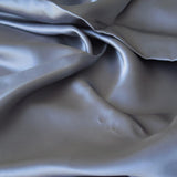 Gunmetal Sandwash Satin — lightweight and soft with a smooth luster satin finish, 100% mulberry silk, 140cm wide