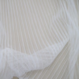 Ivory Pleated Tulle — lightweight and soft, 100% polyester, 145cm wide