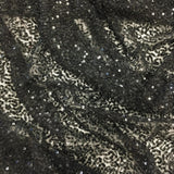 Black Sequin Georgette — heavily sequined on a 100% silk georgette base, with sequins running the length, 110cm wide