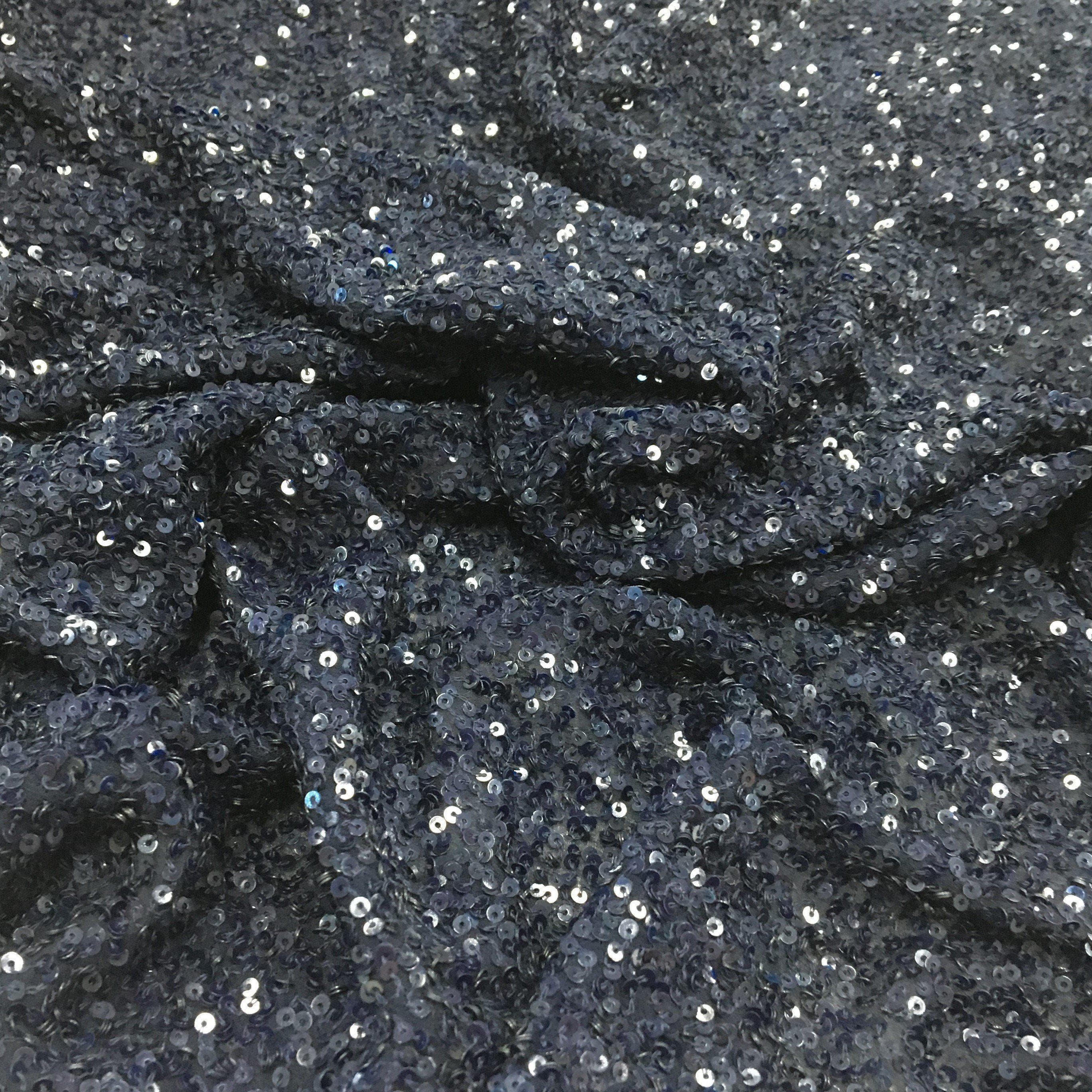 Navy Sequin Georgette — heavily sequined on a 100% silk georgette base, with sequins running the length, 110cm wide