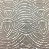 Ivory Scallop Sequin Tulle — featuring scalloped edges and sequins, 100% nylon, 110cm wide