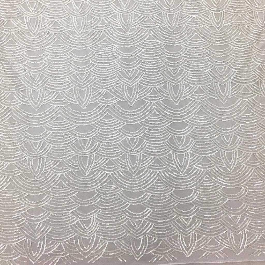Ivory Scallop Sequin Tulle — featuring scalloped edges and sequins, 100% nylon, 110cm wide
