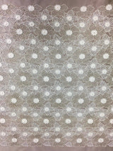 Ivory Floral Beaded Tulle — featuring floral motifs and hand-beading, 100% nylon, 105cm wide