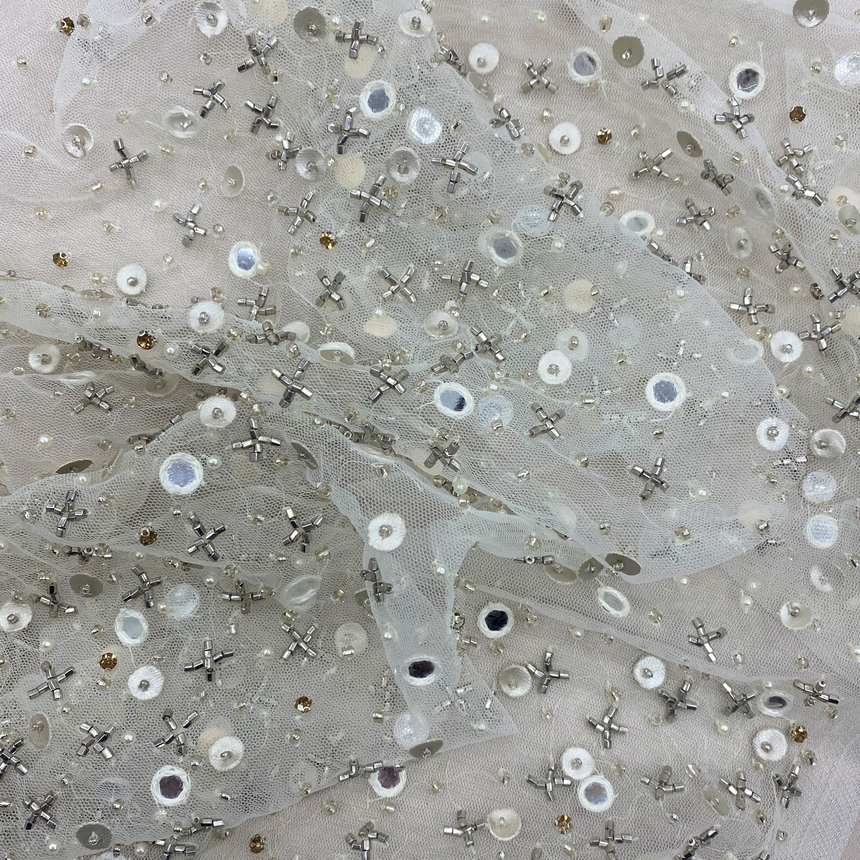 Ivory Beaded Tulle — featuring hand-beading and sequins, 100% nylon, 140cm wide