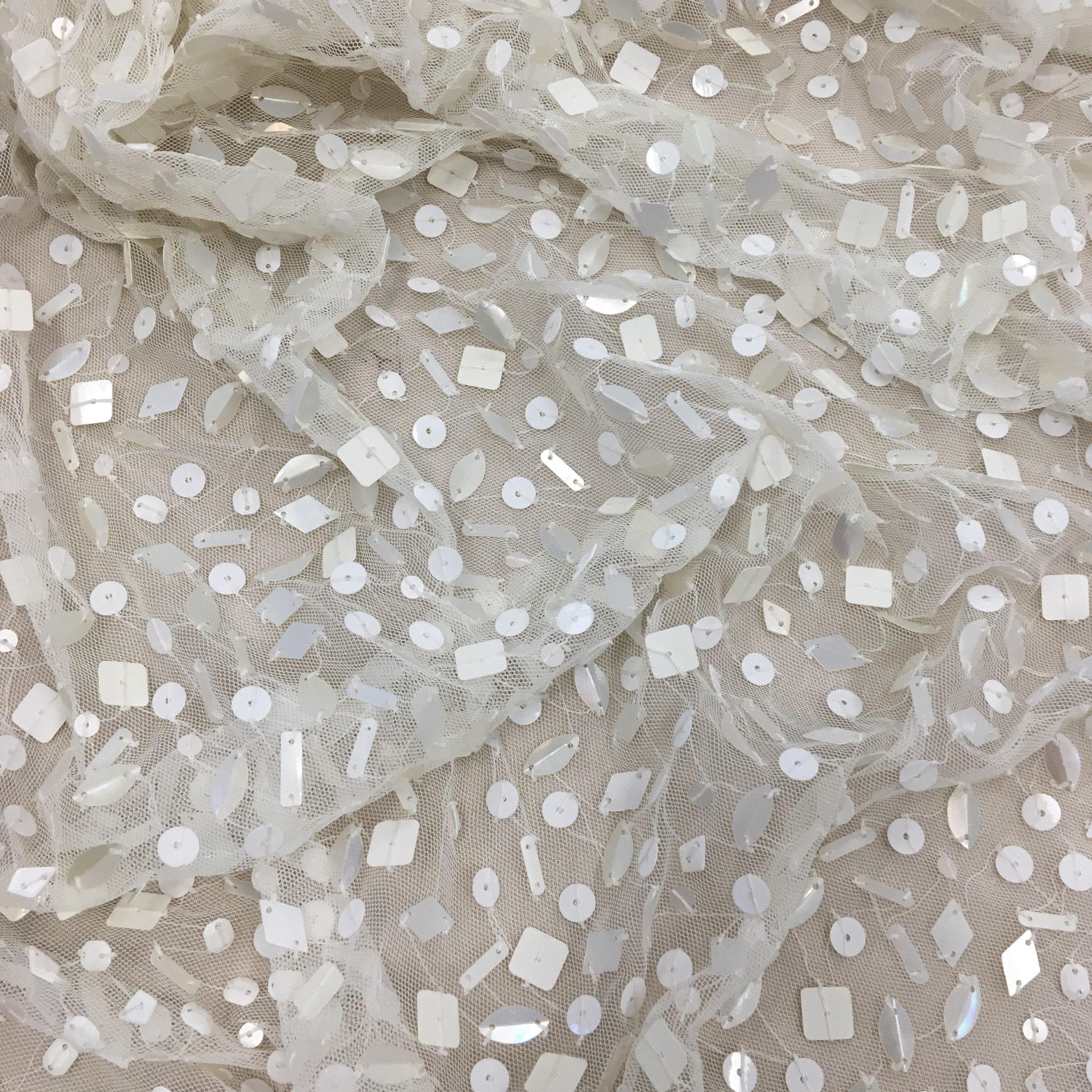 Ivory Sequin Tulle — featuring sequins, 100% nylon, 110cm wide