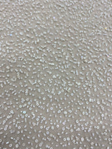 Ivory Beaded Tulle — featuring hand-beading and sequins, 100% nylon, 110cm wide