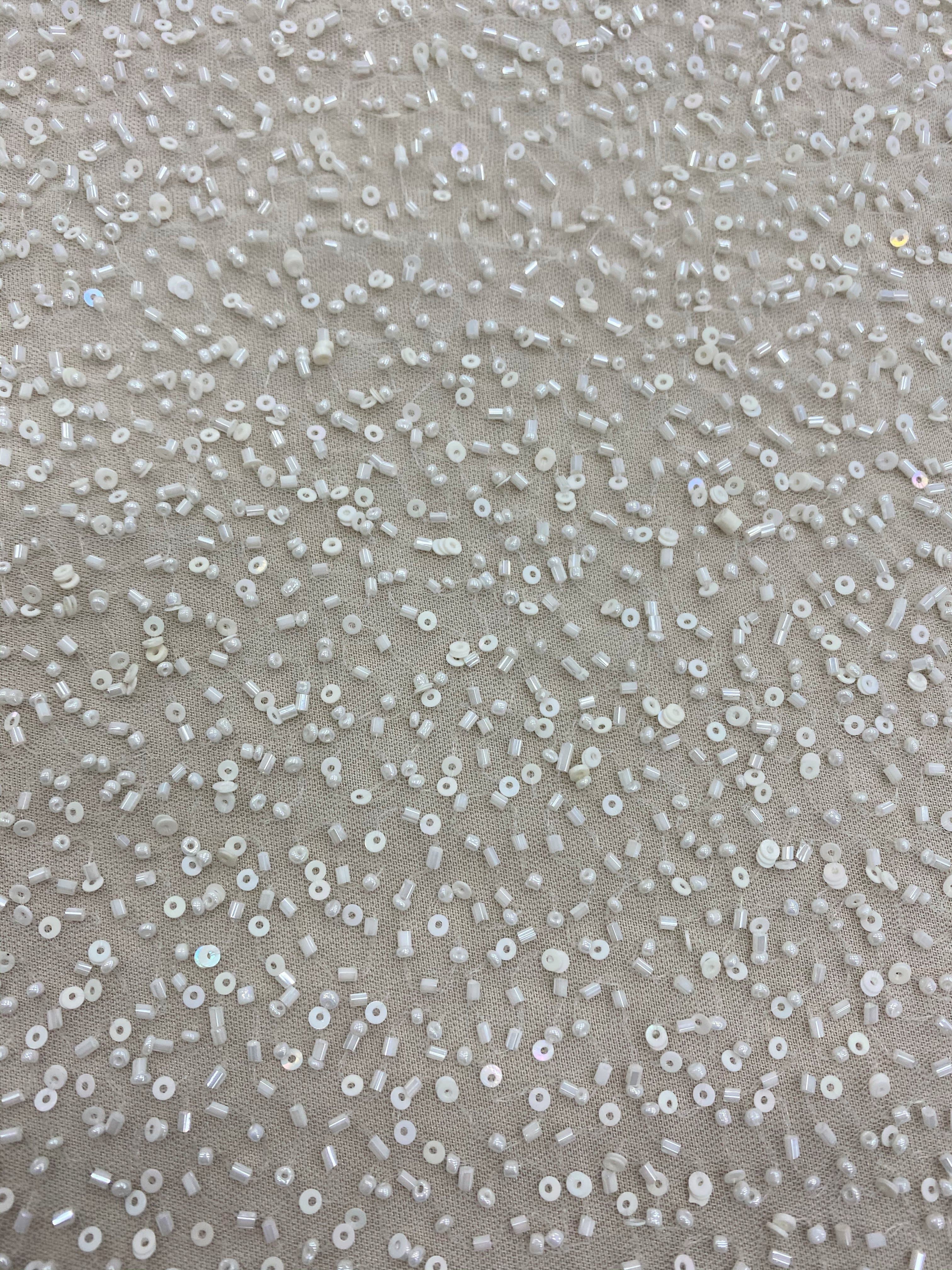 Ivory Beaded Tulle — featuring hand-beading and sequins, 100% nylon, 110cm wide