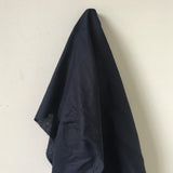 Navy Linen — mid-weight plain-weave linen with a slightly crisp handle that softens with wear, 100% linen, 135cm wide