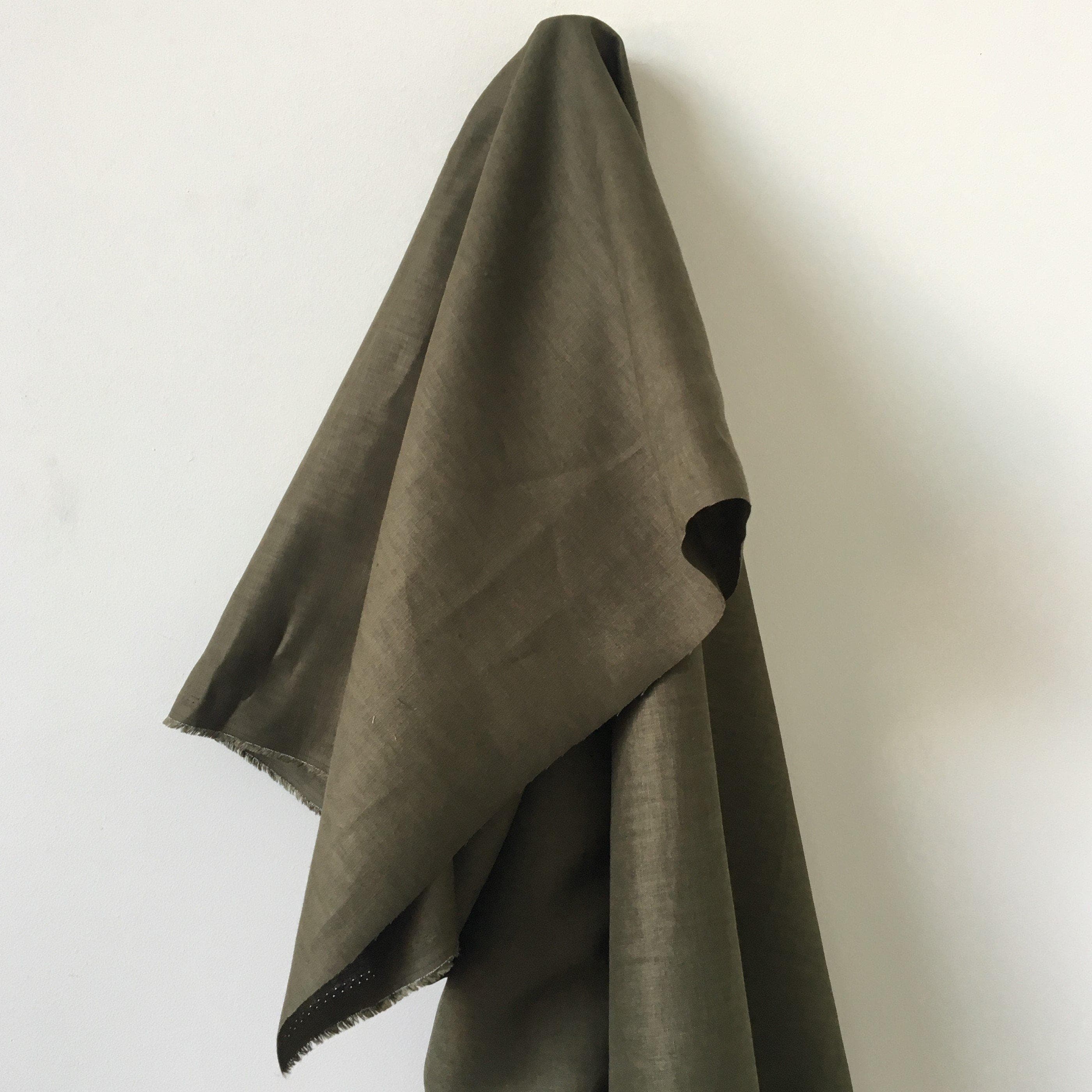 Olive Linen — mid-weight plain-weave linen with a slightly crisp handle that softens with wear, 100% linen, 135cm wide