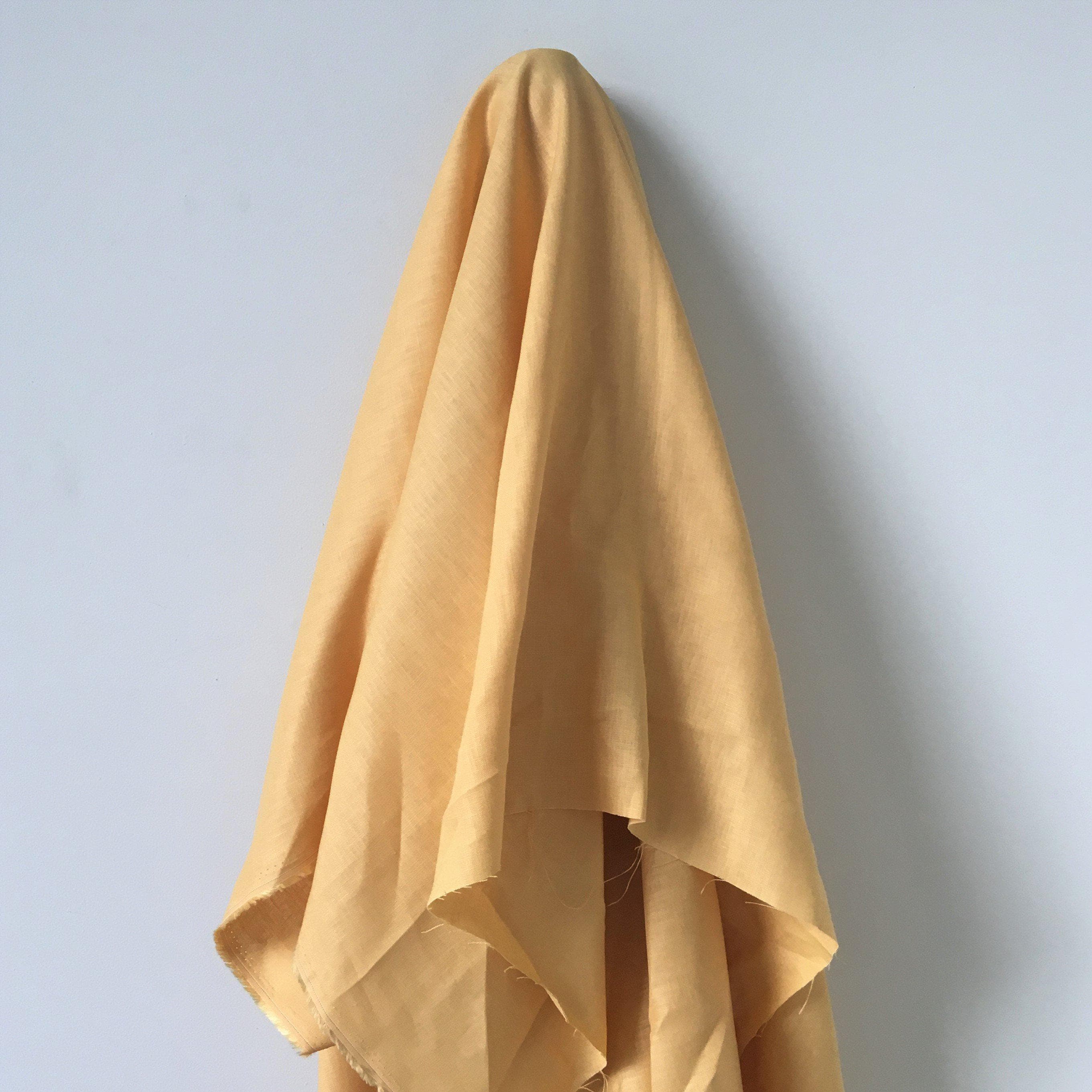 Sunflower Linen — mid-weight plain-weave linen with a slightly crisp handle that softens with wear, 100% linen, 135cm wide