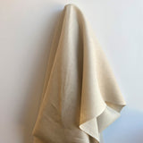 Champagne Linen — mid-weight plain-weave linen with a slightly crisp handle that softens with wear, 100% linen, 135cm wide