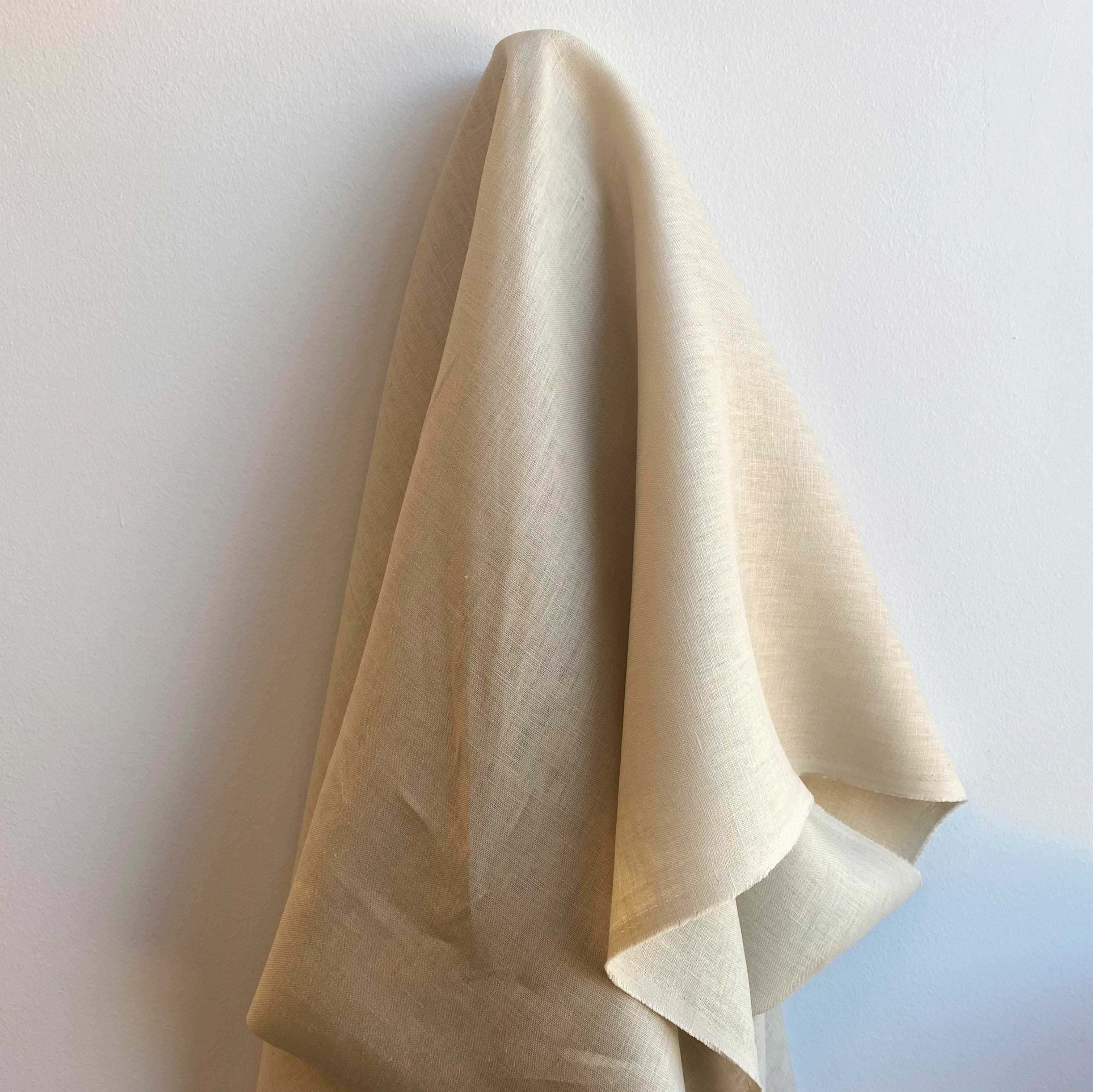 Champagne Linen — mid-weight plain-weave linen with a slightly crisp handle that softens with wear, 100% linen, 135cm wide